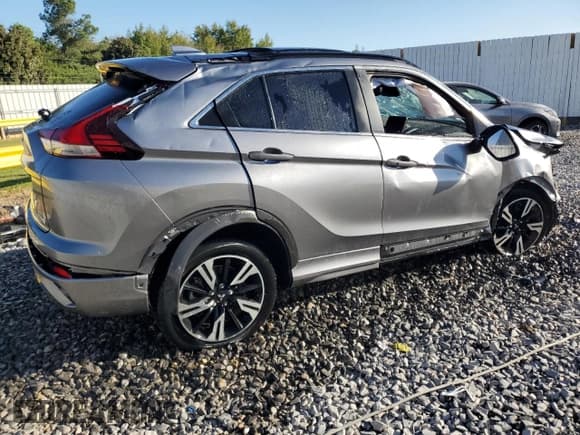 ✅ 2023 Mitsubishi Eclipse Cross SE • VIN: JA4ATWAA8PZ004433 • Лот: 87442485. Опубликован ранее на Copart с пробегом 59 952 миль. Бесплатный доступ к архиву аукционных продаж из США и подробный отчёт об истории автомобиля на DreamBid. Изображение 3.