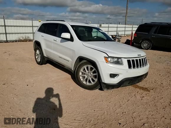 ✅ 2015 Jeep Grand Cherokee Laredo • VIN: 1C4RJEAG4FC109095 • Lot: 70170205. Listed on Copart with 83,614 mi. Free auction sales archive from the USA and detailed vehicle history report at DreamBid. Image 14.