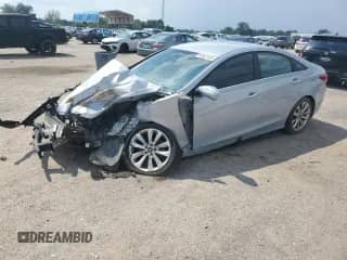 2013 Hyundai Sonata Limited with VIN 5NPEC4AC2DH668601, listed as a Copart auction lot 63607455 with 120,748 mi miles and Salvage title. Bid and sale history available at DreamBid. Image 1.