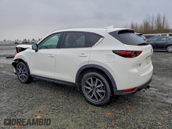 ✅ 2018 Mazda CX-5 Grand Touring • VIN: JM3KFBDM4J0337411 • Lot: 94065165. Listed on Copart with 51,618 mi. Free auction sales archive from the USA and detailed vehicle history report at DreamBid. Image 2.