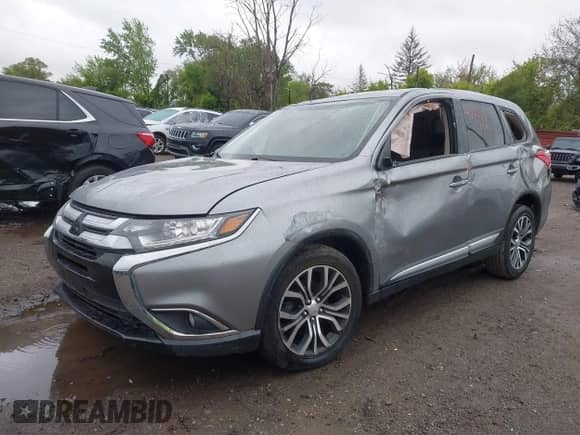 2018 Mitsubishi Outlander SE with VIN JA4AD3A38JZ017431, listed as a IAAI auction lot 42257141 with 91,808 mi miles and . Bid and sale history available at DreamBid. Image 2.