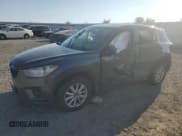 ✅ 2014 Mazda CX-5 Touring • VIN: JM3KE4CY5E0306659 • Lot: 80895895. Wystawiony na Copart z przebiegiem 140 340 mil. Bezpłatny archiwum sprzedaży aukcyjnych z USA i szczegółowy raport historii pojazdu na DreamBid. Zdjęcie 1.
