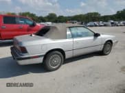 ✅ 1991 Chrysler LeBaron • VIN: 1C3XJ45K0MG149068 • Lot: 80796665. Wystawiony na Copart z przebiegiem 51 529 mil. Bezpłatny archiwum sprzedaży aukcyjnych z USA i szczegółowy raport historii pojazdu na DreamBid. Zdjęcie 3.