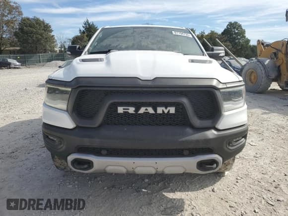 ✅ 2021 Ram 1500 Rebel • VIN: 1C6SRFLT3MN639688 • Lot: 87194735. Wystawiony na Copart z przebiegiem 98 375 mil. Bezpłatny archiwum sprzedaży aukcyjnych z USA i szczegółowy raport historii pojazdu na DreamBid. Zdjęcie 5.