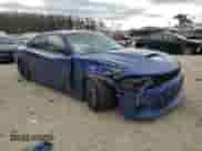 2022 Dodge Charger R/T with VIN 2C3CDXCTXNH153394, listed as a Copart auction lot 47682344 with 38,858 mi miles and Salvage title. Bid and sale history available at DreamBid. Image 4.