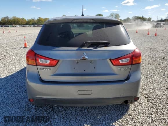 2014 Mitsubishi Outlander ES z VIN 4A4AR3AU6EE008040, wystawiony jako Copart lot #86866405 z przebiegiem 191 926 mil mil oraz Szkoda całkowita • Salvage title. Historia ofert i sprzedaży dostępna na DreamBid. Obrazek 6.