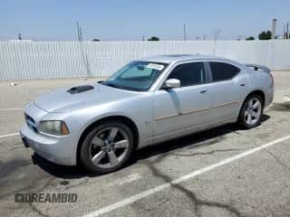 2010 Dodge Charger Rallye z VIN 2B3CA9CV2AH250862, wystawiony jako Copart lot #60355405 z przebiegiem 247 501 mil mil oraz Czysty tytuł • Clean title. Historia ofert i sprzedaży dostępna na DreamBid. Obrazek 1.