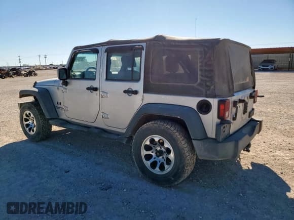 ✅ 2007 Jeep Wrangler Unlimited X • VIN: 1J4GA39197L230261 • Lot: 90951435. Listed on Copart with 110,545 mi. Free auction sales archive from the USA and detailed vehicle history report at DreamBid. Image 2.