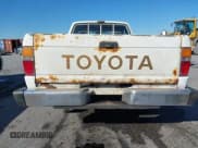 ✅ 1985 Toyota Pickup Deluxe • VIN: JT4RN56D3F0130668 • Lot: 43530597. Wystawiony na IAAI z przebiegiem 104 289 mil. Bezpłatny archiwum sprzedaży aukcyjnych z USA i szczegółowy raport historii pojazdu na DreamBid. Zdjęcie 12.