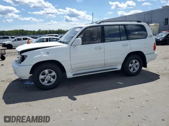 ✅ 2002 Toyota Land Cruiser • VIN: JTEHT05J022028895 • Lot: 70348635. Listed on Copart with 154,453 mi. Free auction sales archive from the USA and detailed vehicle history report at DreamBid. Image 1.