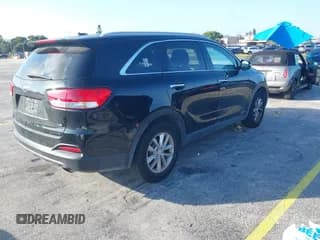 ✅ 2017 Kia Sorento LX • VIN: 5XYPGDA56HG313863 • Lot: 43847232. Listed on IAAI with 105,042 mi. Free auction sales archive from the USA and detailed vehicle history report at DreamBid. Image 4.