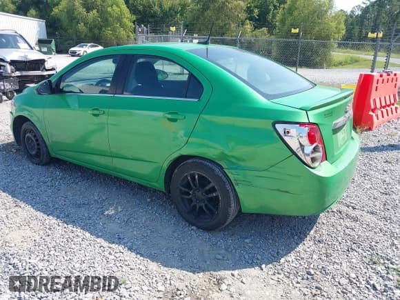 ✅ 2014 Chevrolet Sonic LT • VIN: 1G1JC5SH9E4224940 • Lot: 43197953. Listed on IAAI with 128,391 mi. Free auction sales archive from the USA and detailed vehicle history report at DreamBid. Image 3.