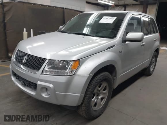 ✅ 2008 Suzuki Grand Vitara w/Spare & Cargo Covers • VIN: JS3TD941X84101254 • Lot: 42043908. Listed on IAAI with 137,180 mi. Free auction sales archive from the USA and detailed vehicle history report at DreamBid. Image 17.