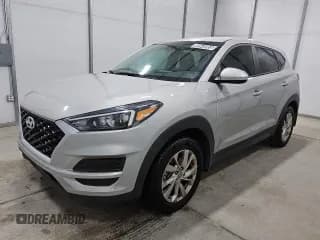 ✅ 2021 Hyundai Tucson SE • VIN: KM8J23A40MU338669 • Lot: 89545955. Listed on Copart with 74,329 mi. Free auction sales archive from the USA and detailed vehicle history report at DreamBid. Image 1.