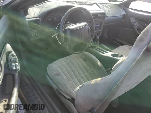 1997 Chevrolet Camaro z VIN 2G1FP22K6V2114714, wystawiony jako Copart lot #42320245 z przebiegiem 239 087 mil mil oraz Szkoda całkowita • Salvage title. Historia ofert i sprzedaży dostępna na DreamBid. Obrazek 8.