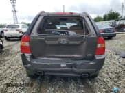 ✅ 2006 Kia Sportage LX • VIN: KNDJE723X67233079 • Lot: 56394225. Listed on Copart with 202,237 mi. Free auction sales archive from the USA and detailed vehicle history report at DreamBid. Image 6.