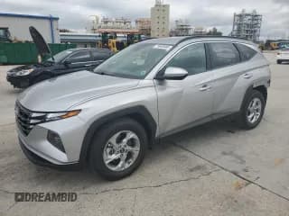 ✅ 2022 Hyundai Tucson SEL • VIN: 5NMJB3AE5NH048532 • Lot: 70656404. Wystawiony na Copart z przebiegiem 9 384 mil. Bezpłatny archiwum sprzedaży aukcyjnych z USA i szczegółowy raport historii pojazdu na DreamBid. Zdjęcie 1.