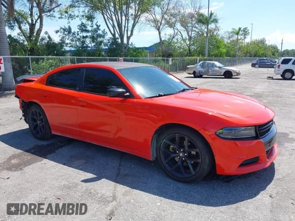 ✅ 2020 Dodge Charger SXT • VIN: 2C3CDXBG9LH150455 • Lot: 42340018. Listed on IAAI with 107,359 mi. Free auction sales archive from the USA and detailed vehicle history report at DreamBid. Image 1.