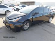 ✅ 2021 Toyota Prius LE • VIN: JTDKAMFUXM3147857 • Lot: 43635437. Wystawiony na IAAI z przebiegiem 105 003 mil. Bezpłatny archiwum sprzedaży aukcyjnych z USA i szczegółowy raport historii pojazdu na DreamBid. Zdjęcie 2.