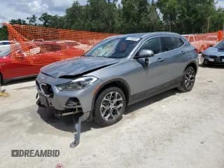 ✅ 2023 BMW X2 sDrive28i • VIN: WBXYH9C09P5V63656 • Лот: 61390965. Опубликован ранее на Copart с пробегом 44 081 миль. Бесплатный доступ к архиву аукционных продаж из США и подробный отчёт об истории автомобиля на DreamBid. Изображение 1.