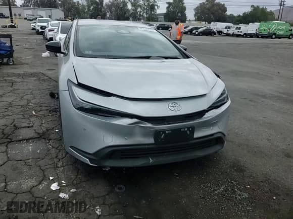 2024 Toyota Prius LE с VIN JTDACAAU4R3020914, выставлен на аукционе Copart как лот 86600665 с пробегом 29 243 миль миль и Списание • Salvage title. История ставок и продаж доступна на DreamBid. Изображение 13.