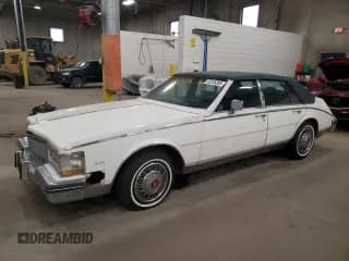 ✅ 1985 Cadillac Seville • VIN: 1G6KS6988FE838662 • Lot: 92235385. Wystawiony na Copart z przebiegiem 10 704 mil. Bezpłatny archiwum sprzedaży aukcyjnych z USA i szczegółowy raport historii pojazdu na DreamBid. Zdjęcie 1.