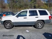 ✅ 2000 Jeep Grand Cherokee Laredo • VIN: 1J4GW48S4YC286840 • Lot: 43593023. Listed on IAAI with 196,888 mi. Free auction sales archive from the USA and detailed vehicle history report at DreamBid. Image 14.