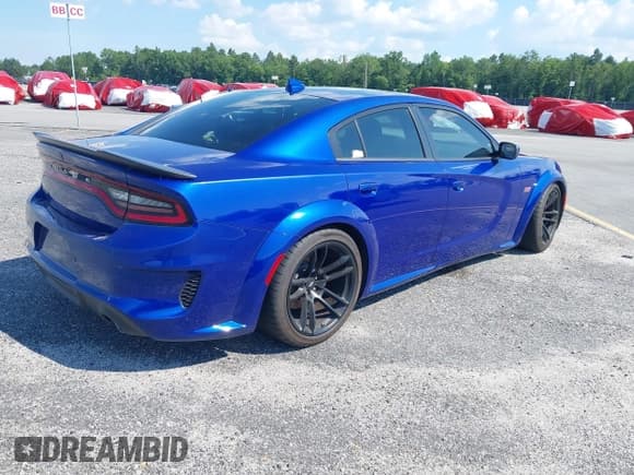 ✅ 2022 Dodge Charger Scat Pack Widebody • VIN: 2C3CDXGJ0NH176255 • Lot: 39576763. Wystawiony na IAAI z przebiegiem 18 324 mil. Bezpłatny archiwum sprzedaży aukcyjnych z USA i szczegółowy raport historii pojazdu na DreamBid. Zdjęcie 4.