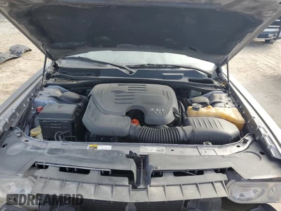 ✅ 2013 Dodge Challenger SXT • VIN: 2C3CDYAG7DH695501 • Lot: 77080244. Wystawiony na Copart z przebiegiem Nie podano. Bezpłatny archiwum sprzedaży aukcyjnych z USA i szczegółowy raport historii pojazdu na DreamBid. Zdjęcie 11.