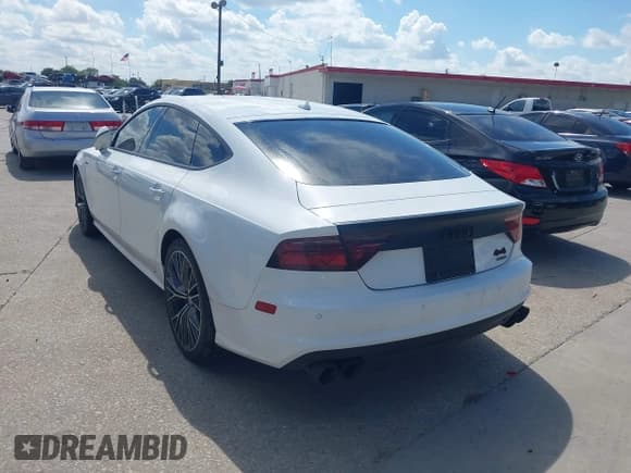 ✅ 2016 Audi A7 Premium Plus • VIN: WAUWGAFC0GN076342 • Lot: 43296426. Listed on IAAI with 128,185 mi. Free auction sales archive from the USA and detailed vehicle history report at DreamBid. Image 3.