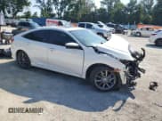 ✅ 2021 Honda Civic EX-L • VIN: 19XFC1F73ME000874 • Lot: 70060905. Listed on Copart with 25,060 mi. Free auction sales archive from the USA and detailed vehicle history report at DreamBid. Image 4.