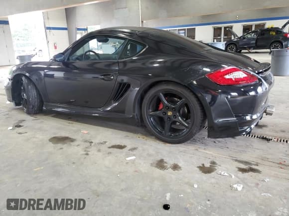 ✅ 2006 Porsche Cayman S • VIN: WP0AB29816U780563 • Лот: 80658255. Опубликован ранее на Copart с пробегом 148 049 миль. Бесплатный доступ к архиву аукционных продаж из США и подробный отчёт об истории автомобиля на DreamBid. Изображение 2.