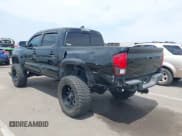 ✅ 2018 Toyota Tacoma SR • VIN: 5TFCZ5ANXJX144089 • Lot: 42761947. Wystawiony na IAAI z przebiegiem 129 568 mil. Bezpłatny archiwum sprzedaży aukcyjnych z USA i szczegółowy raport historii pojazdu na DreamBid. Zdjęcie 6.