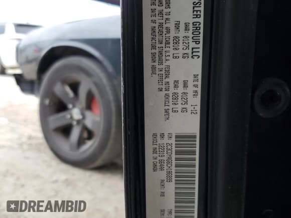 ✅ 2012 Dodge Challenger SXT • VIN: 2C3CDYAG6CH186899 • Lot: 74016534. Wystawiony na Copart z przebiegiem 241 873 mil. Bezpłatny archiwum sprzedaży aukcyjnych z USA i szczegółowy raport historii pojazdu na DreamBid. Zdjęcie 13.