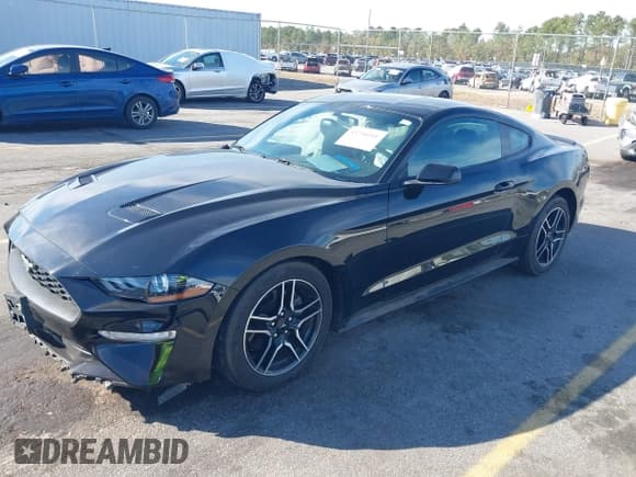 ✅ 2018 Ford Mustang EcoBoost • VIN: 1FA6P8TH7J5173871 • Lot: 43730311. Listed on IAAI with 61,772 mi. Free auction sales archive from the USA and detailed vehicle history report at DreamBid. Image 2.