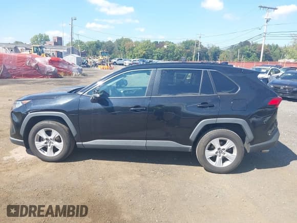 ✅ 2019 Toyota RAV4 XLE • VIN: 2T3W1RFV3KW012477 • Лот: 43271739. Опубликован ранее на IAAI с пробегом 188 136 миль. Бесплатный доступ к архиву аукционных продаж из США и подробный отчёт об истории автомобиля на DreamBid. Изображение 14.