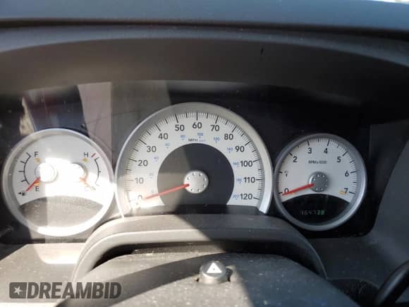 2009 Dodge Dakota Laramie z VIN 1D7HW58P19S743046, wystawiony jako Copart lot #68725635 z przebiegiem 164 738 mil mil oraz Szkoda całkowita • Salvage title. Historia ofert i sprzedaży dostępna na DreamBid. Obrazek 9.