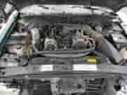 1999 Chevrolet Blazer LT z VIN 1GNDT13W9X2200556, wystawiony jako Copart lot #43933415 z przebiegiem 127 382 mil mil oraz Szkoda całkowita • Salvage title. Historia ofert i sprzedaży dostępna na DreamBid. Obrazek 13.