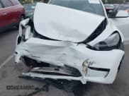 ✅ 2024 Tesla Model Y • VIN: 7SAYGDED6RF166543 • Лот: 41713362. Опубликован ранее на IAAI с пробегом Не указан. Бесплатный доступ к архиву аукционных продаж из США и подробный отчёт об истории автомобиля на DreamBid. Изображение 6.