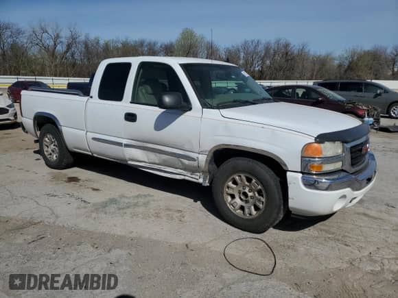 2007 GMC Sierra 1500 SLE1 with VIN 1GTEC19Z57Z194065, listed as a Copart auction lot 49217385 with 126,958 mi miles and Salvage title. Bid and sale history available at DreamBid. Image 4.