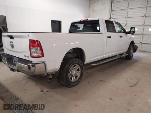 ✅ 2023 Ram 2500 Tradesman • VIN: 3C6UR5HL0PG529660 • Lot: 41491722. Listed on IAAI with 43,672 mi. Free auction sales archive from the USA and detailed vehicle history report at DreamBid. Image 4.