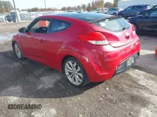 2012 Hyundai Veloster w/Red Int with VIN KMHTC6AD8CU065292, listed as a IAAI auction lot 43619012 with 156,498 mi miles and . Bid and sale history available at DreamBid. Image 3.