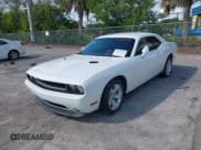 ✅ 2013 Dodge Challenger SXT • VIN: 2C3CDYAG5DH693813 • Lot: 43558979. Listed on IAAI with 188,863 mi. Free auction sales archive from the USA and detailed vehicle history report at DreamBid. Image 2.