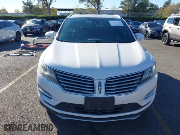 ✅ 2015 Lincoln MKC • VIN: 5LMTJ2AH6FUJ13553 • Lot: 43585464. Listed on IAAI with 136,864 mi. Free auction sales archive from the USA and detailed vehicle history report at DreamBid. Image 13.