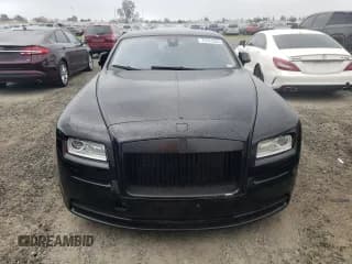 ✅ 2014 Rolls-Royce Wraith • VIN: SCA665C5XEUX84336 • Lot: 73181343. Wystawiony na Copart z przebiegiem 34 367 mil. Bezpłatny archiwum sprzedaży aukcyjnych z USA i szczegółowy raport historii pojazdu na DreamBid. Zdjęcie 5.