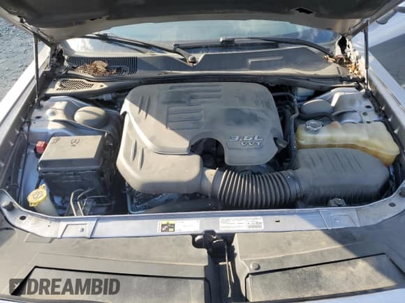 ✅ 2014 Dodge Challenger SXT • VIN: 2C3CDYAG3EH142443 • Lot: 75846514. Wystawiony na Copart z przebiegiem 94 377 mil. Bezpłatny archiwum sprzedaży aukcyjnych z USA i szczegółowy raport historii pojazdu na DreamBid. Zdjęcie 11.