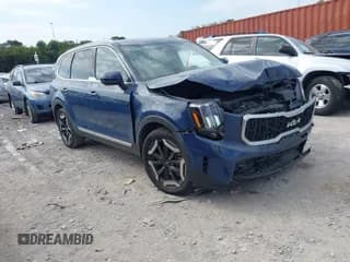 ✅ 2023 Kia Telluride EX • VIN: 5XYP34GC0PG335518 • Lot: 43345634. Listed on IAAI with 59,876 mi. Free auction sales archive from the USA and detailed vehicle history report at DreamBid. Image 1.