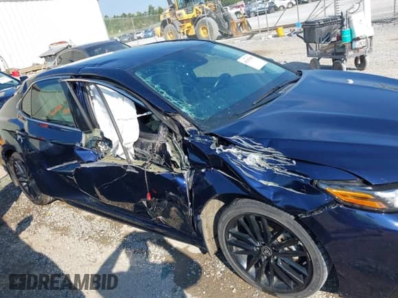 2021 Toyota Camry XSE with VIN 4T1K61AK4MU615383, listed as a IAAI auction lot 43193305 with 57,706 mi miles and . Bid and sale history available at DreamBid. Image 6.