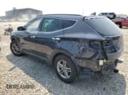 ✅ 2017 Hyundai Santa Fe 2.4L • VIN: 5XYZUDLB5HG448868 • Лот: 64958804. Опубликован ранее на Copart с пробегом 103 076 миль. Бесплатный доступ к архиву аукционных продаж из США и подробный отчёт об истории автомобиля на DreamBid. Изображение 2.