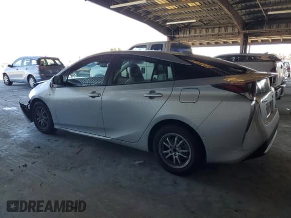 ✅ 2017 Toyota Prius Three • VIN: JTDKARFU6H3031476 • Lot: 82332065. Listed on Copart with 63,930 mi. Free auction sales archive from the USA and detailed vehicle history report at DreamBid. Image 2.